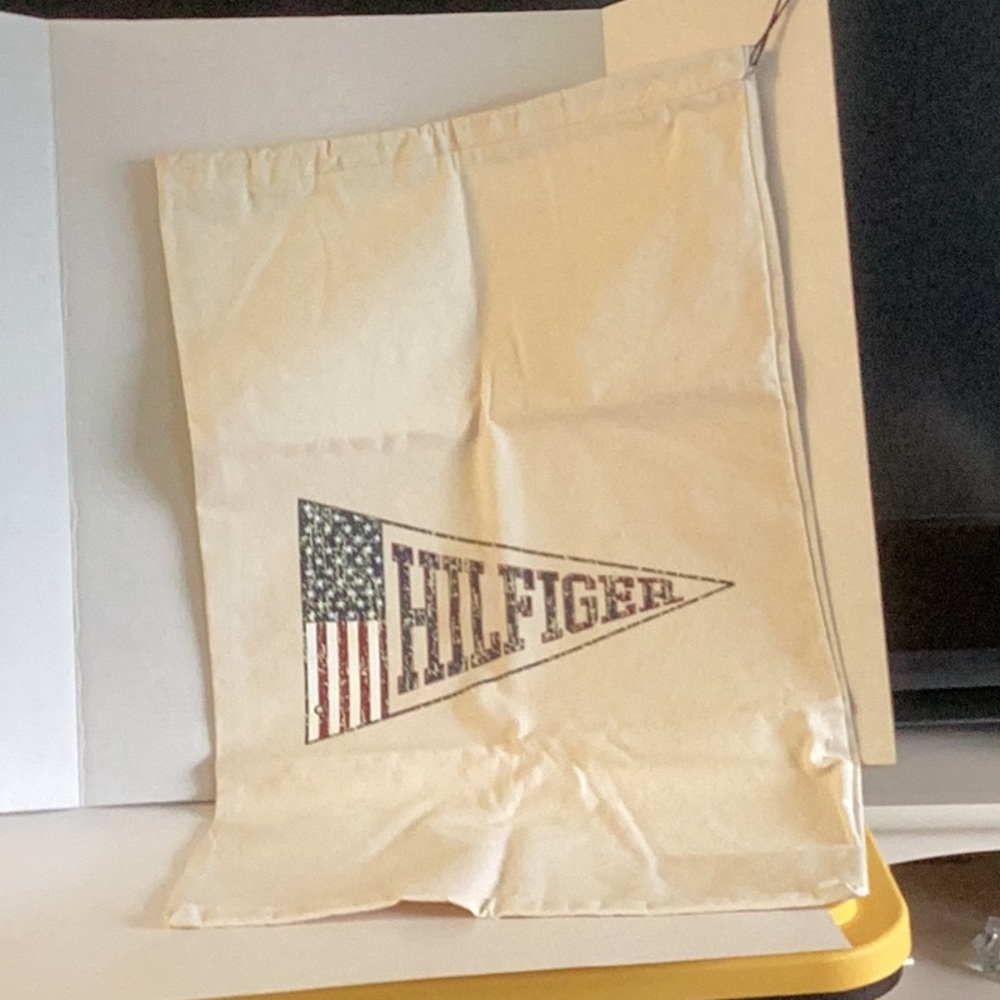 Retro Canvas drawstring laundry bag with Hilfiger Logo on the front.